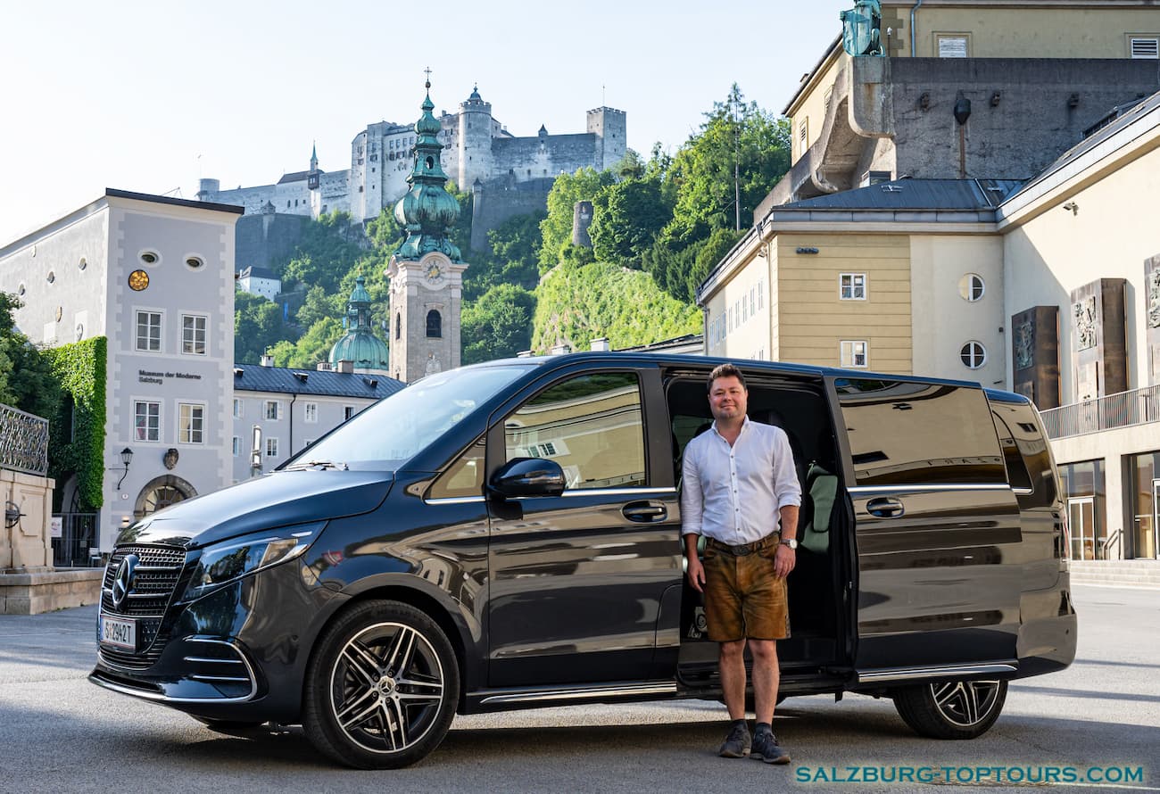 Austria Guide Eugene with a Mercedes-Benz V-Class overlooking Salzburg Old Town Parking