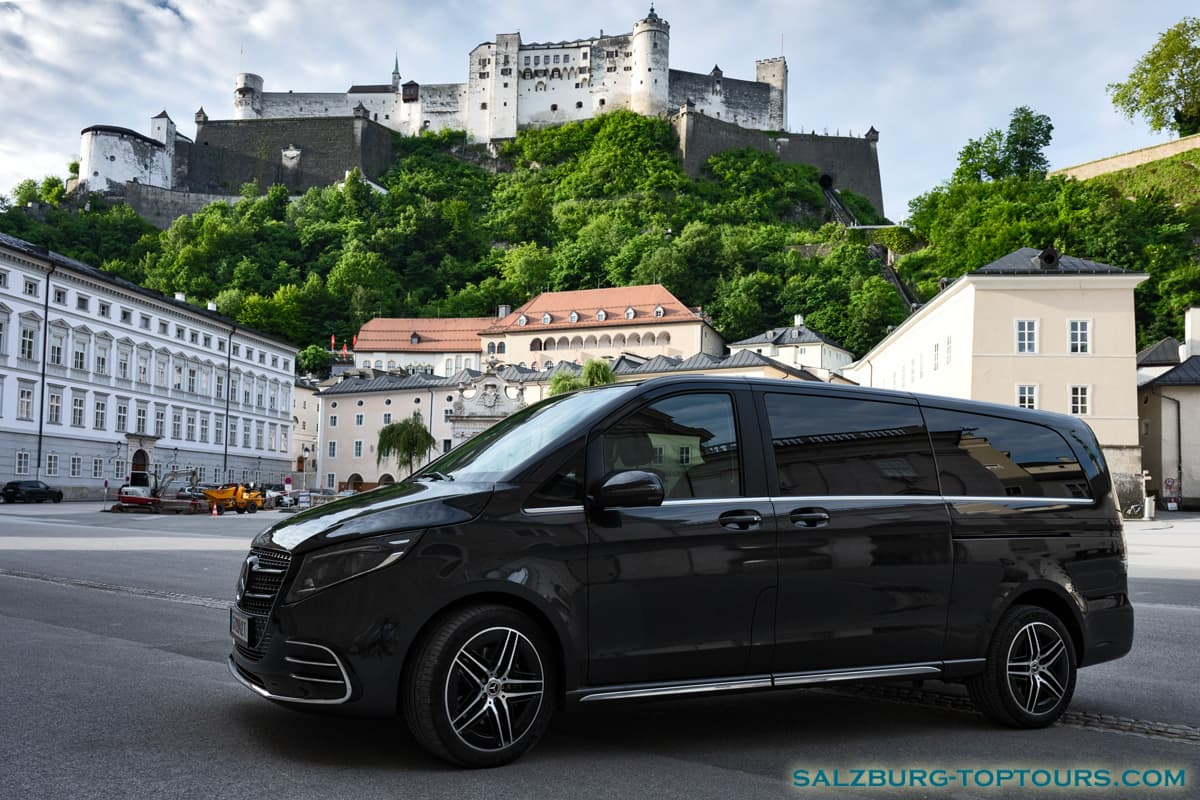 Eugene's Mercedes-Benz V-Class minivan with the Hohensalzburg Fortress in the background.