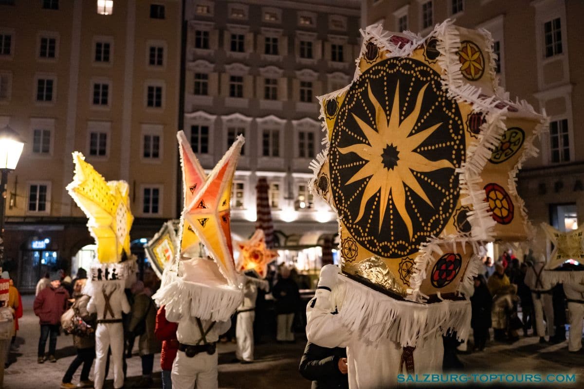 Glockler are most recognizable by their massive, vibrant headdresses, meticulously crafted from thin wooden slats and colorful paper.